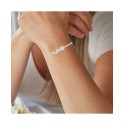 Cubic Zirconia Round Cut Love Tennis Bracelet in Sterling Silver